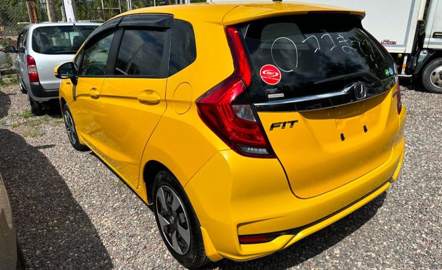 2019 Honda Fit hybrid (yellow)